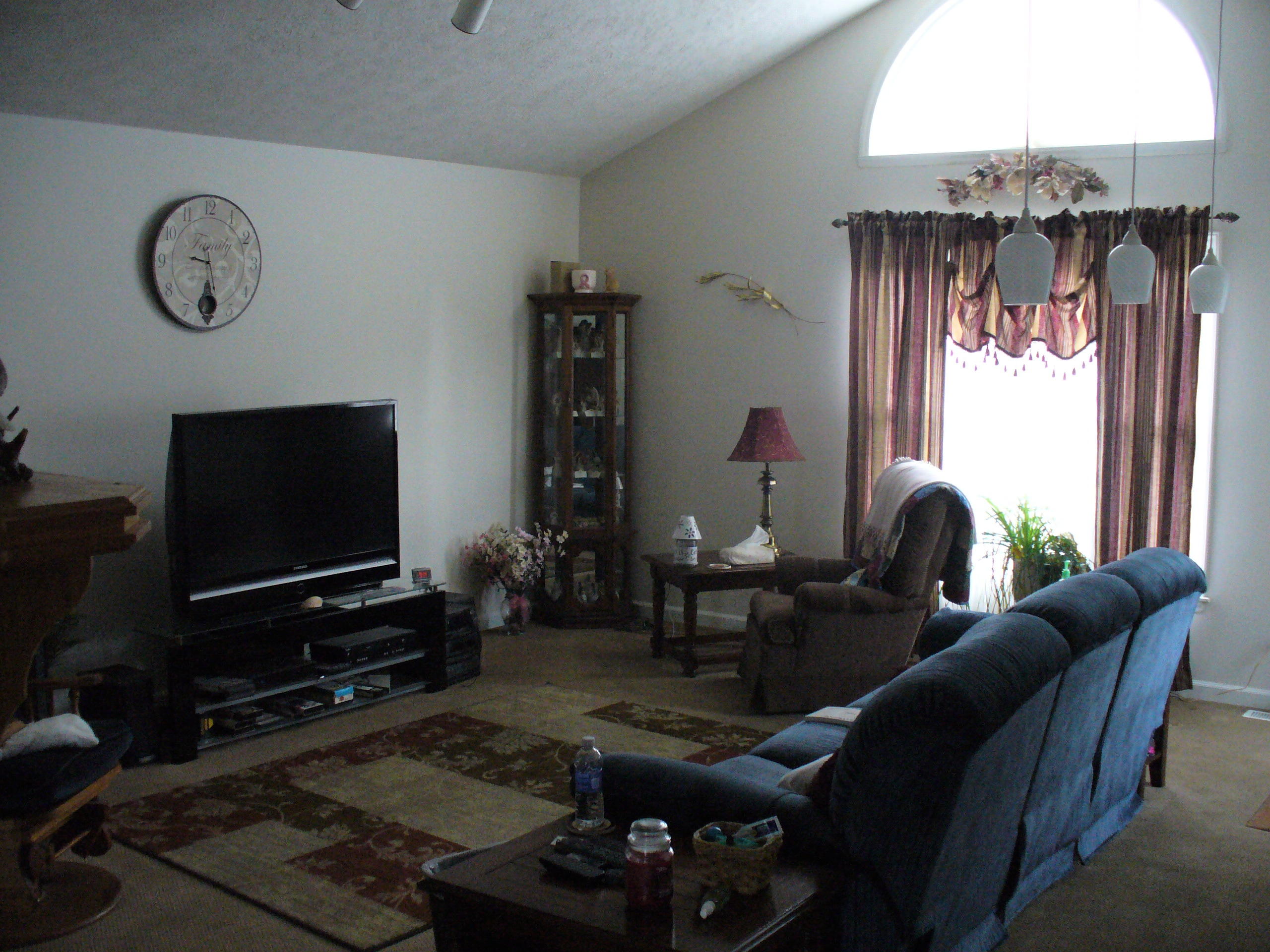 211 Oak Ridge Court Blue Ridge, VA 24064 - Photo 12 of 20 a living room with furniture and a flat screen tv