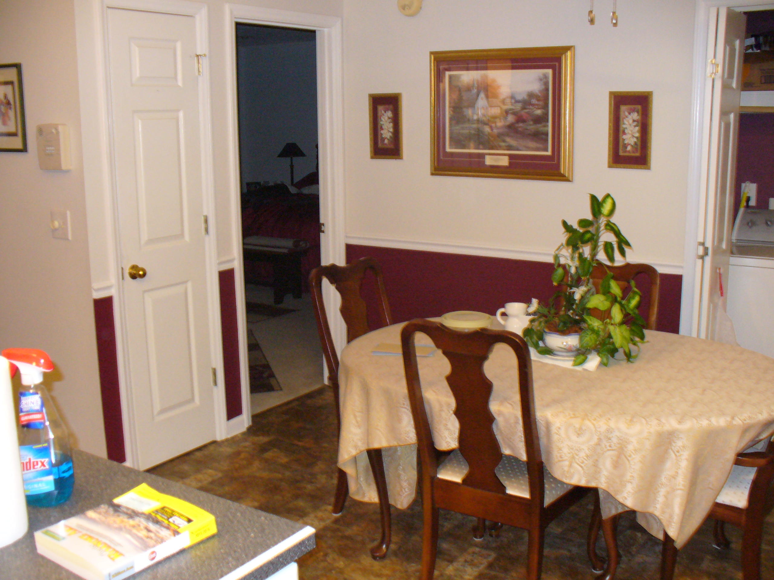 211 Oak Ridge Court Blue Ridge, VA 24064 - Photo 18 of 20 a view of a dining room with furniture and wooden floor