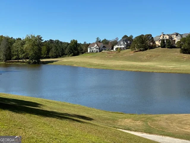 a view of a swimming pool with an ocean view
