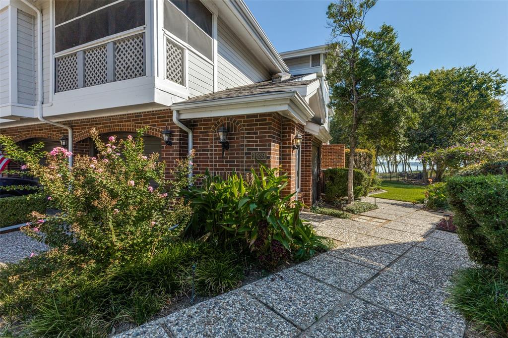 9939 Waterfront Trail Rowlett, TX 75087 - Photo 2 of 25 a view of a house with a yard and potted plants
