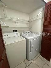 2737 North Poinciana Boulevard, Unit 87 Kissimmee, FL 34746 - Photo 12 of 13 a utility room with dryer and washer