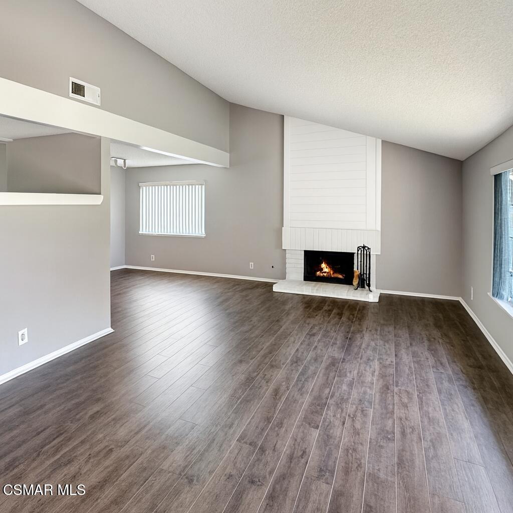 2948 Texas Avenue Simi Valley, CA 93063 - Photo 7 of 32 a view of wooden floor and windows in a room