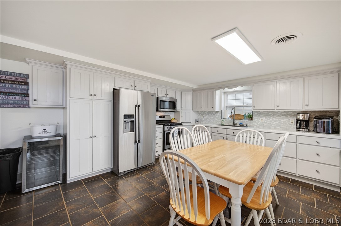27523 Shorty Road Barnett, MO 65011 - Photo 14 of 60 Kitchen and dinning area