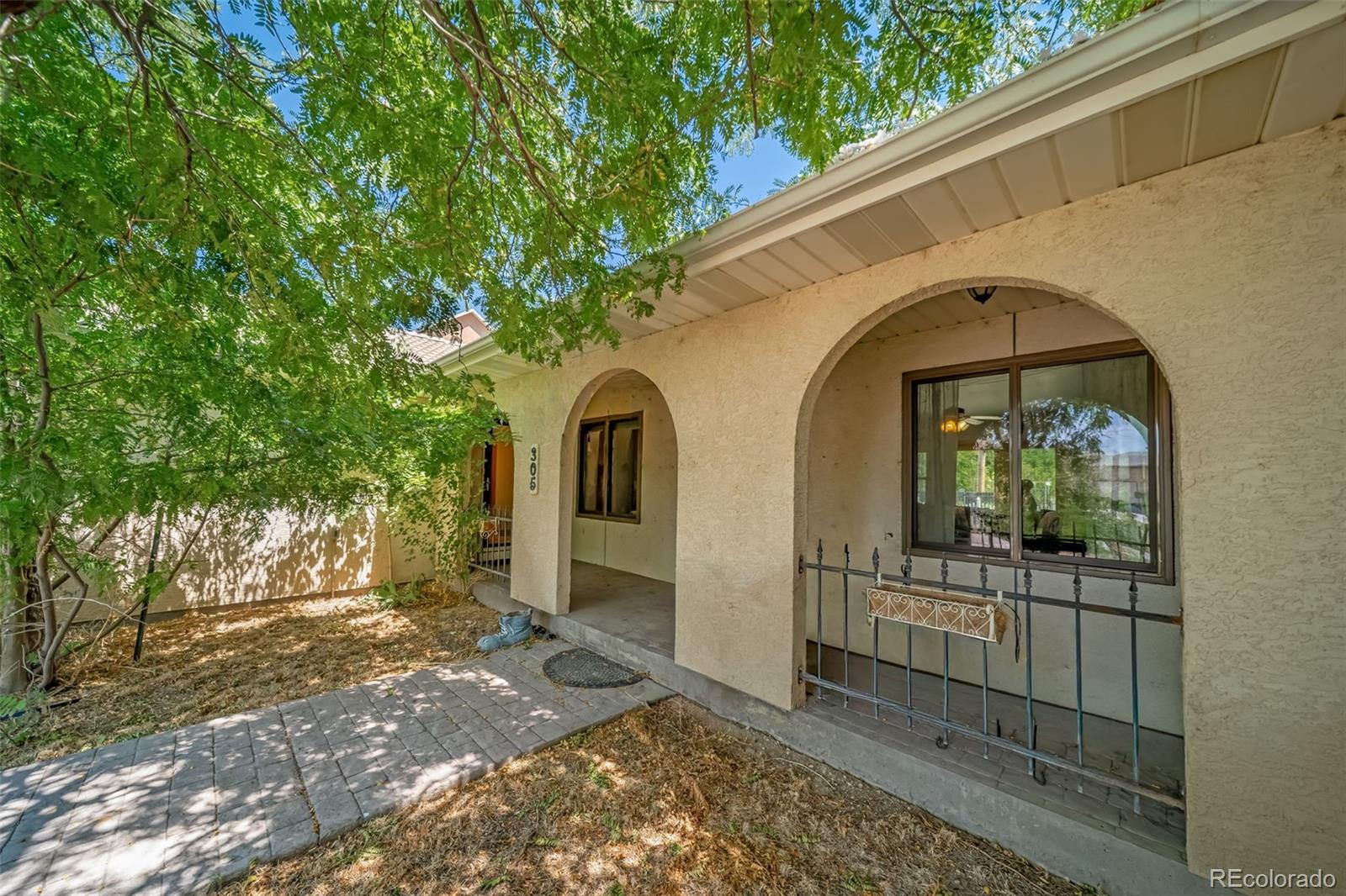 305 Kimble Avenue Swink, CO 81077 - Photo 2 of 44 a view of entryway with garden