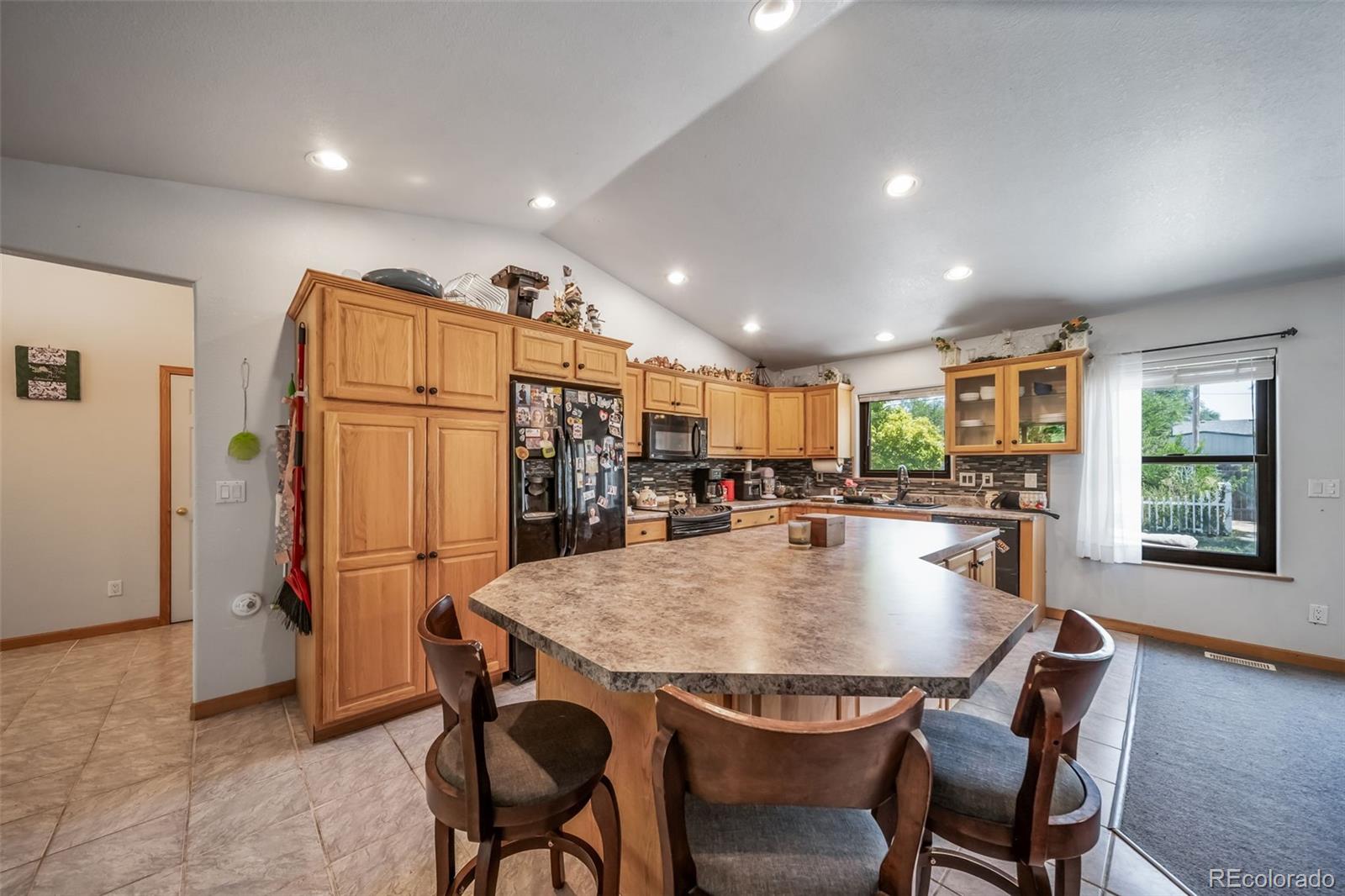 305 Kimble Avenue Swink, CO 81077 - Photo 30 of 44 a dining room with furniture and window