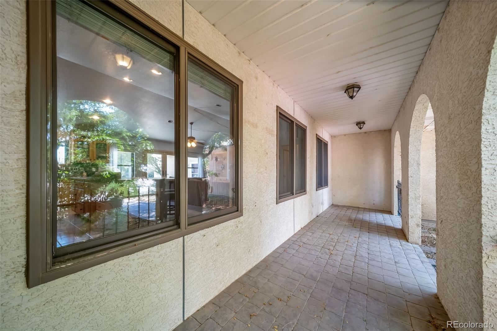 305 Kimble Avenue Swink, CO 81077 - Photo 3 of 44 a view of a hallway with windows