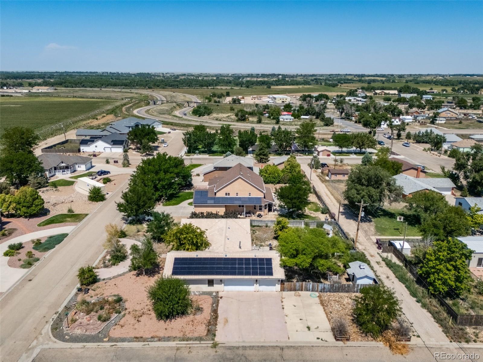 305 Kimble Avenue Swink, CO 81077 - Photo 43 of 44 an aerial view of residential houses with outdoor space