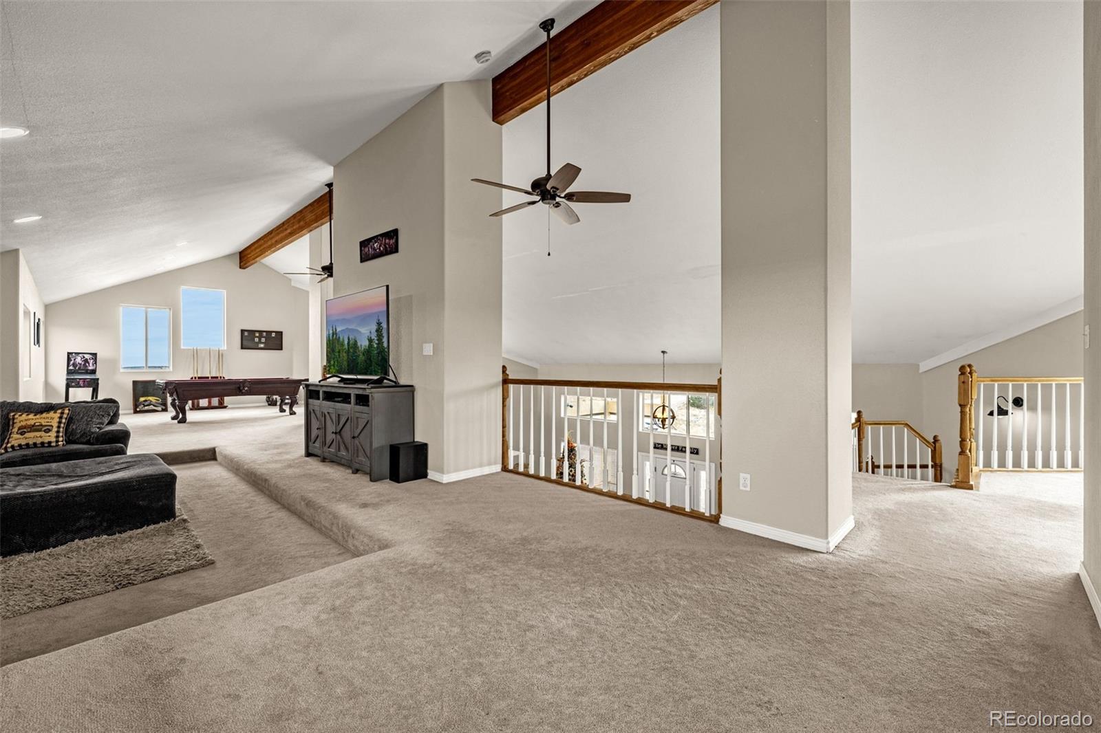 3115 Canyon Heights Road Pueblo, CO 81005 - Photo 14 of 44 a view of a living room and a balcony