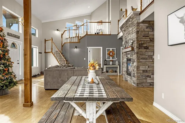 a view of a hall way with furniture