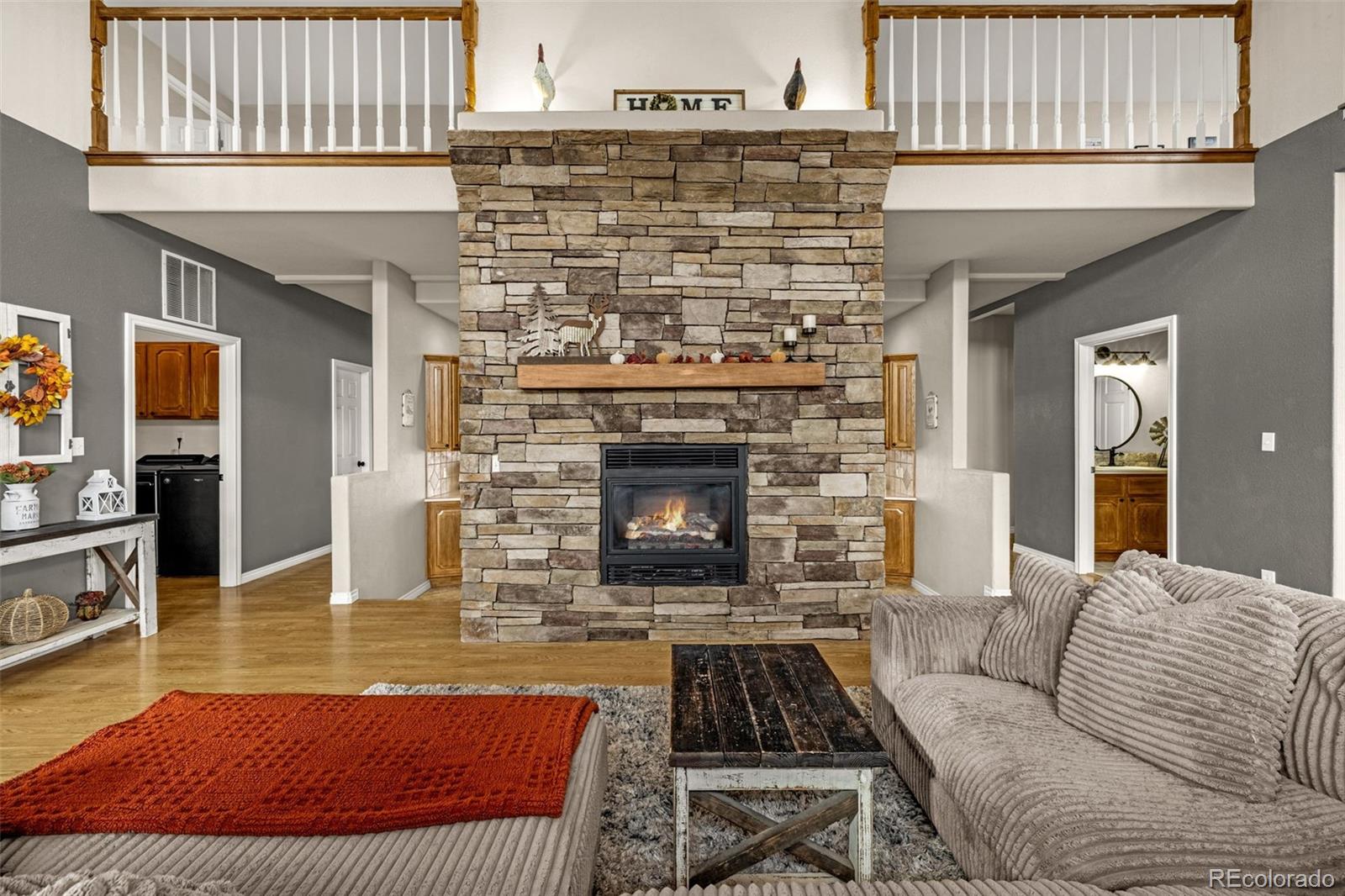 3115 Canyon Heights Road Pueblo, CO 81005 - Photo 3 of 44 a living room with furniture and a fireplace