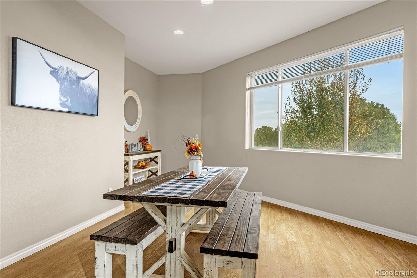 3115 Canyon Heights Road Pueblo, CO 81005 - Photo 9 of 44 a view of a workspace with furniture and a window