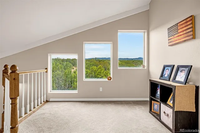 a view of livingroom with furniture and windows