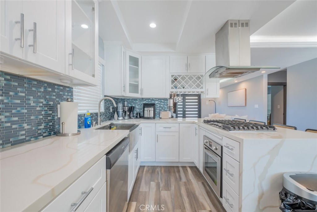 6436 Day Street Tujunga, CA 91042 - Photo 13 of 38 a kitchen with a stove oven and sink