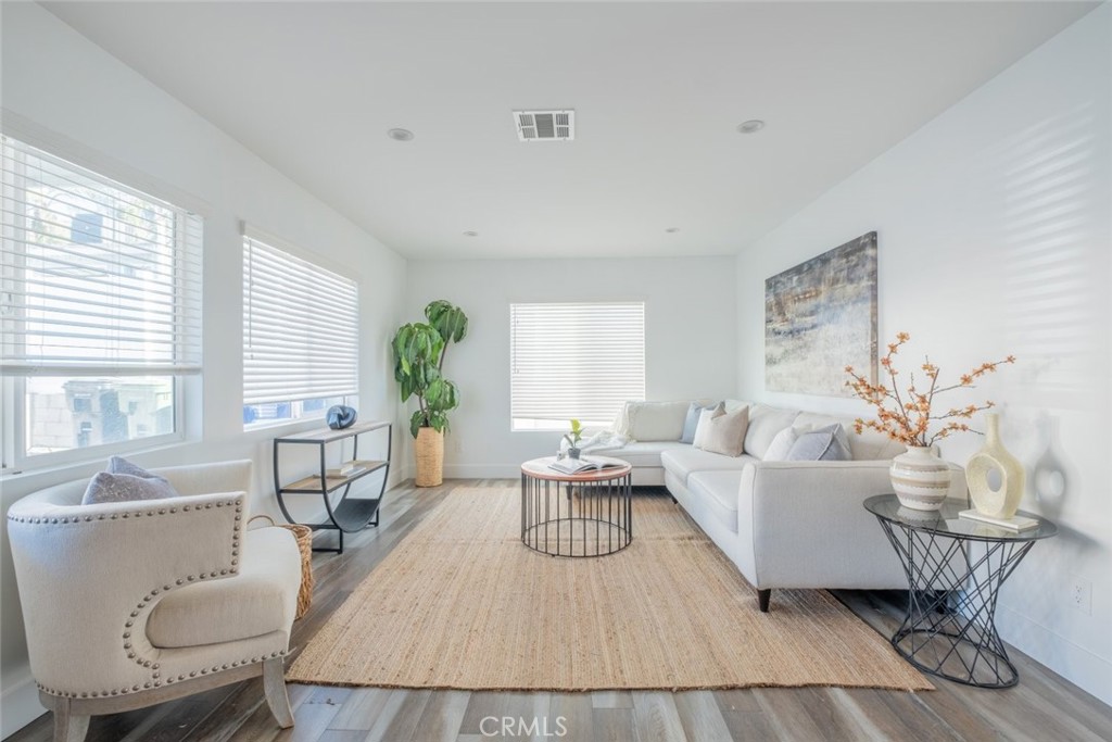 6436 Day Street Tujunga, CA 91042 - Photo 24 of 38 a living room with furniture wooden floor and a table