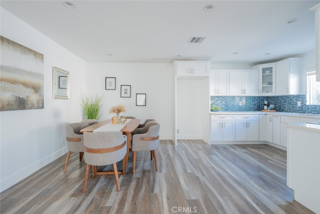 6436 Day Street Tujunga, CA 91042 - Photo 26 of 38 a view of a dining room with furniture and wooden floor