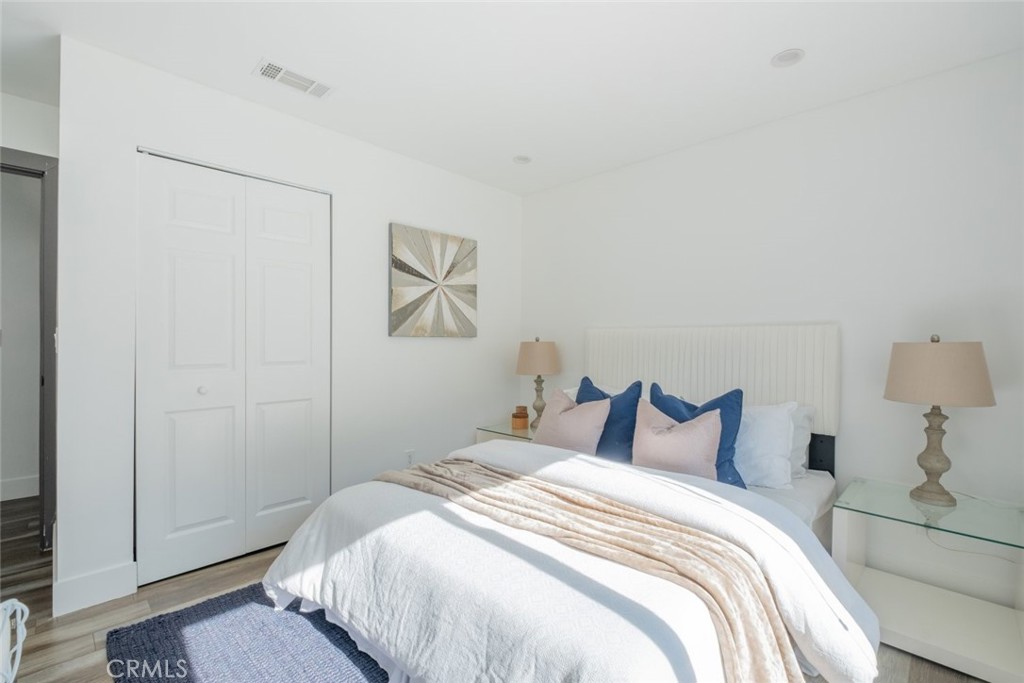 6436 Day Street Tujunga, CA 91042 - Photo 33 of 38 a bedroom with a bed and a painting on the wall