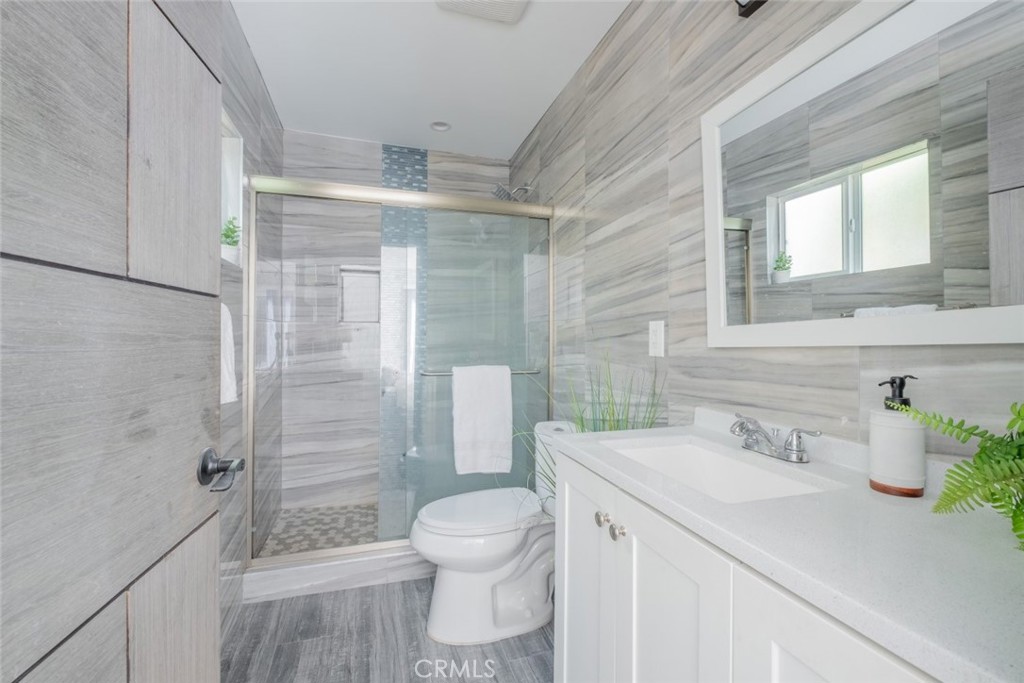 6436 Day Street Tujunga, CA 91042 - Photo 36 of 38 a bathroom with a sink a toilet and shower