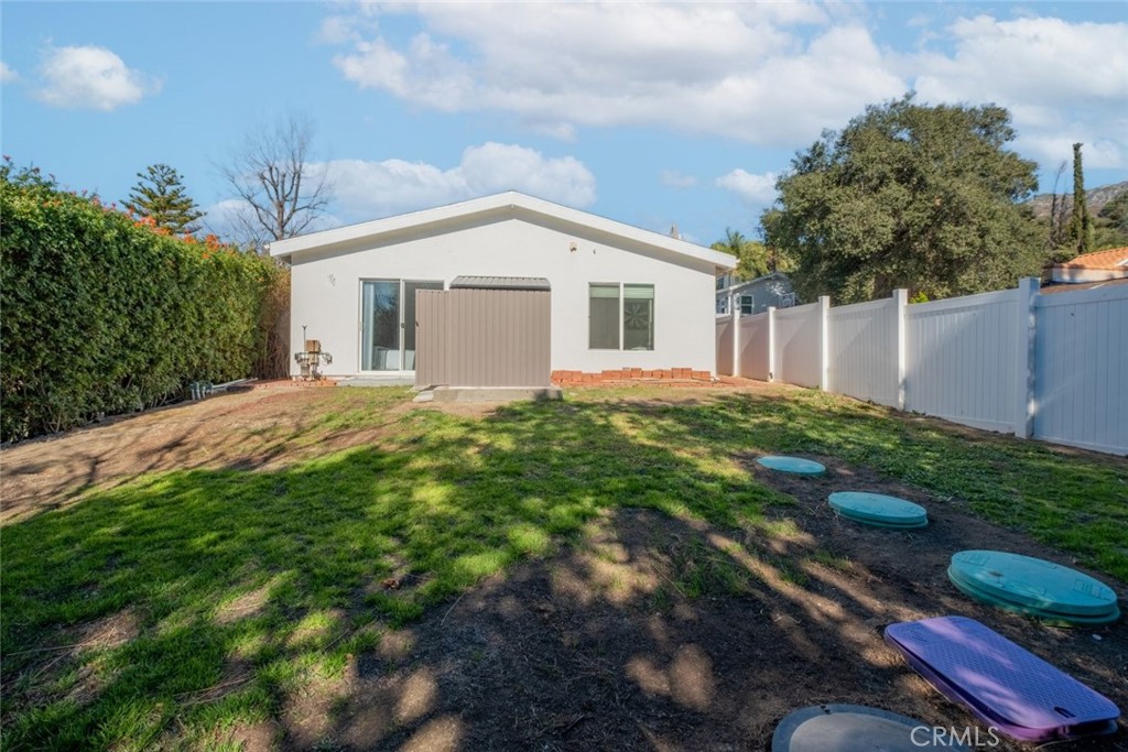 6436 Day Street Tujunga, CA 91042 - Photo 37 of 38 a front view of a house with a yard