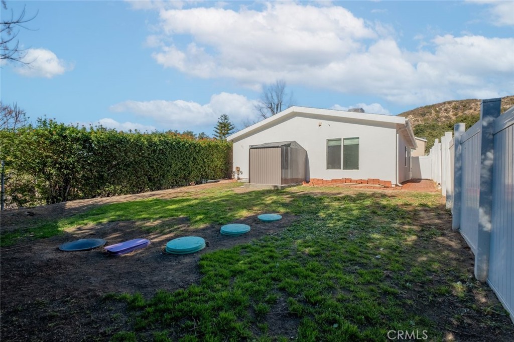 6436 Day Street Tujunga, CA 91042 - Photo 38 of 38 a front view of a house with garden