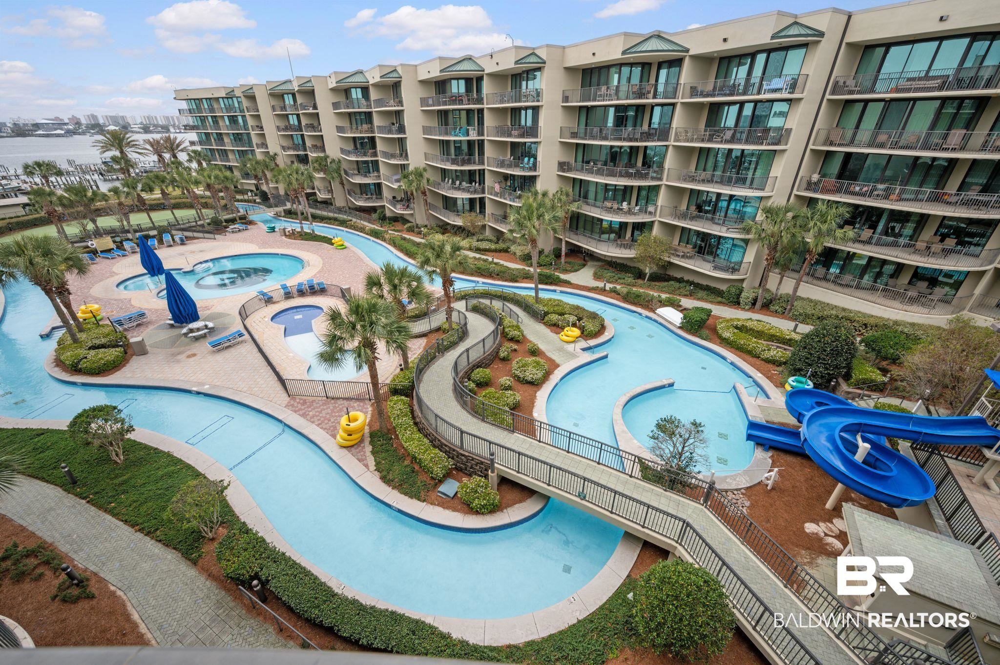 27580 Canal Road, Unit 1427 Orange Beach, AL 36561 - Photo 35 of 38 Community pool with a community hot tub
