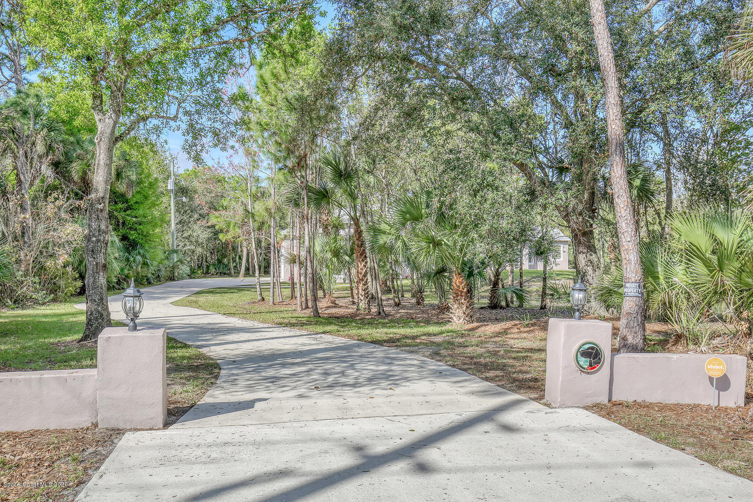 1290 Adamson Road Cocoa, FL 32926 - Photo 1 of 38 Private Winding Driveway Greets You