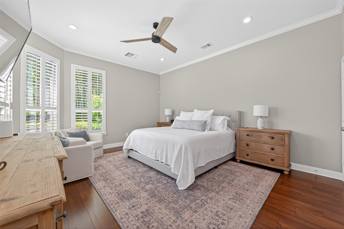 18207 Yukon Ridge Trail Humble, TX 77346 - Photo 17 of 49 The primary bedroom is bright and inviting. Wake up to a view of your backyard oasis.