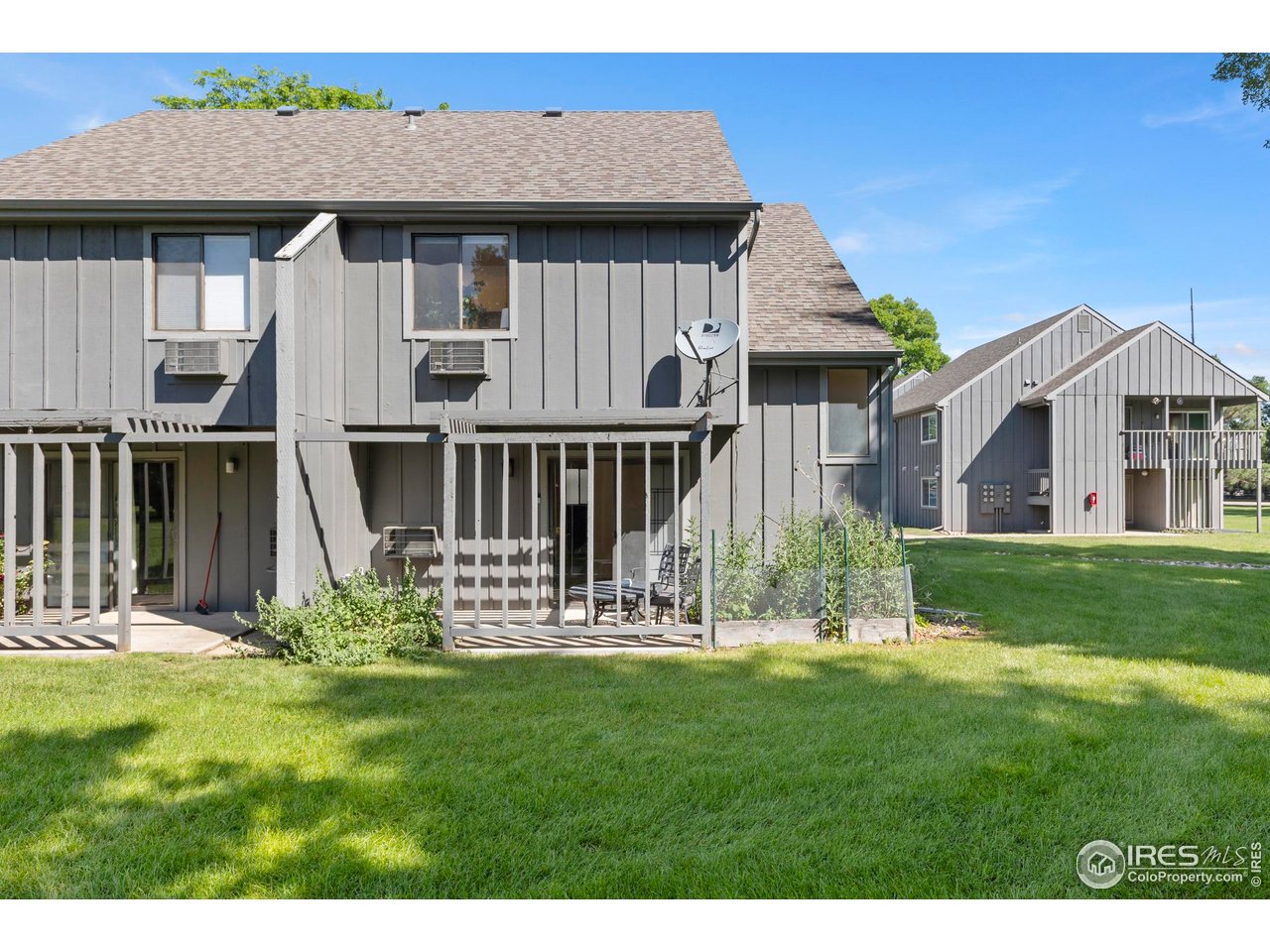 705 East Drake Road, Unit 40 Fort Collins, CO 80525 - Photo 27 of 33 Lovely covered back patio opening to all of the beautiful green space