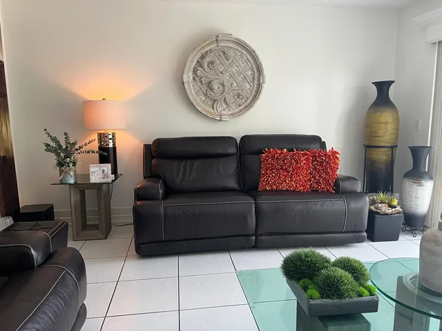 a living room with furniture and a couch
