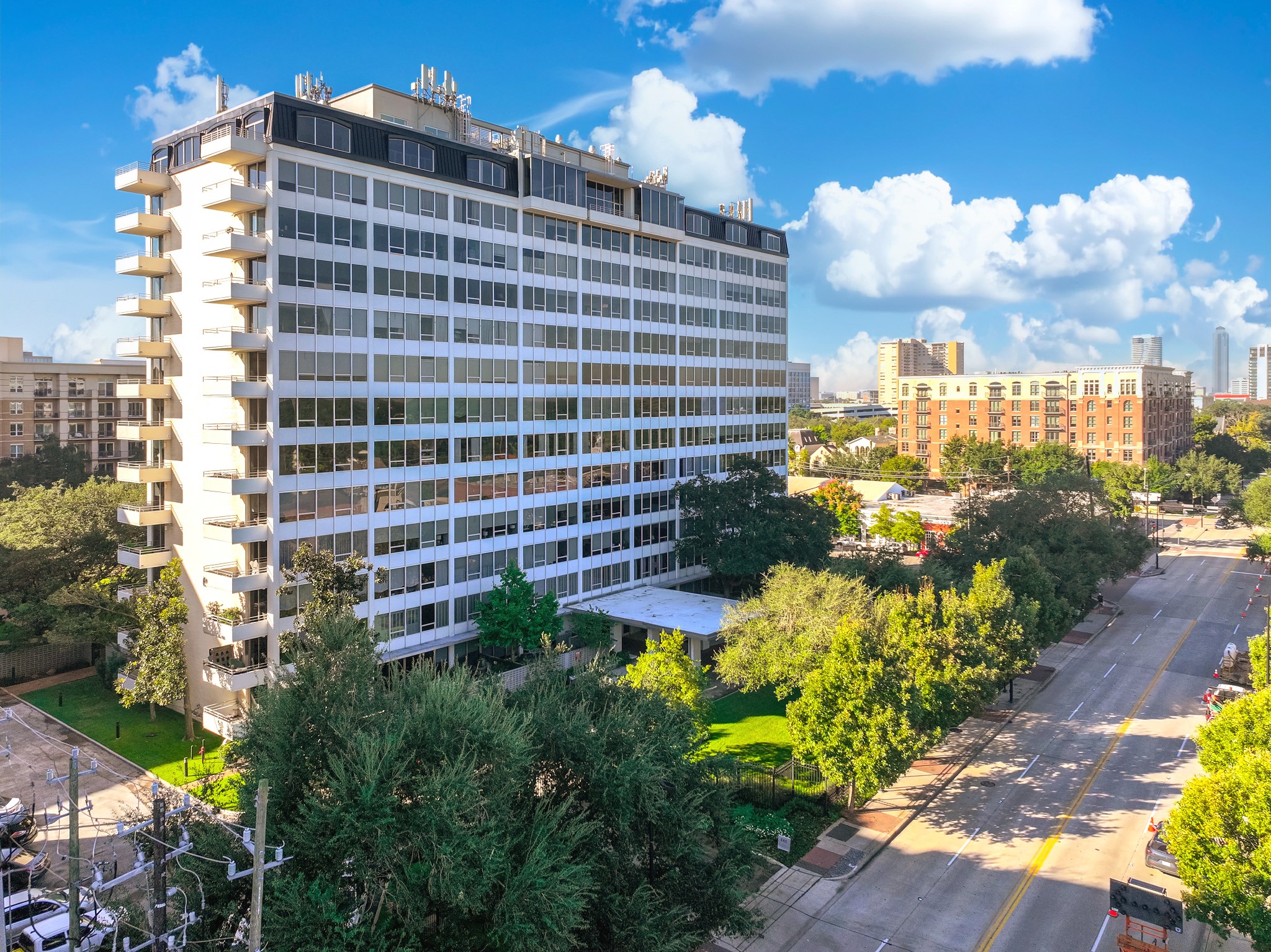 a view of a city with tall buildings