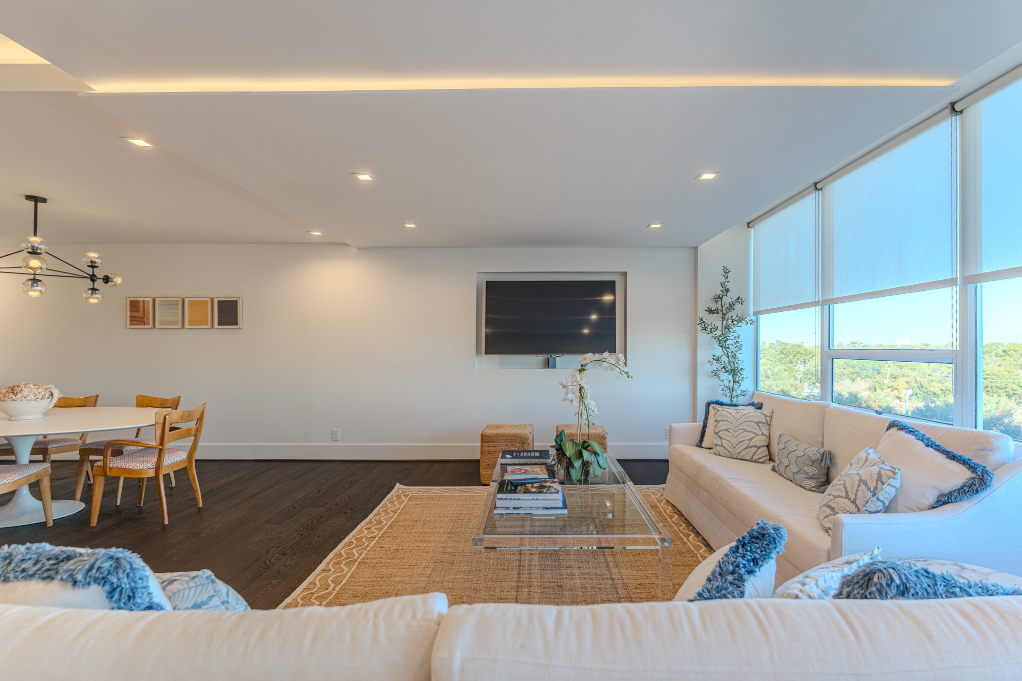 2701 Westheimer Road, Unit 6F Houston, TX 77098 - Photo 14 of 45 a living room with furniture and a flat screen tv