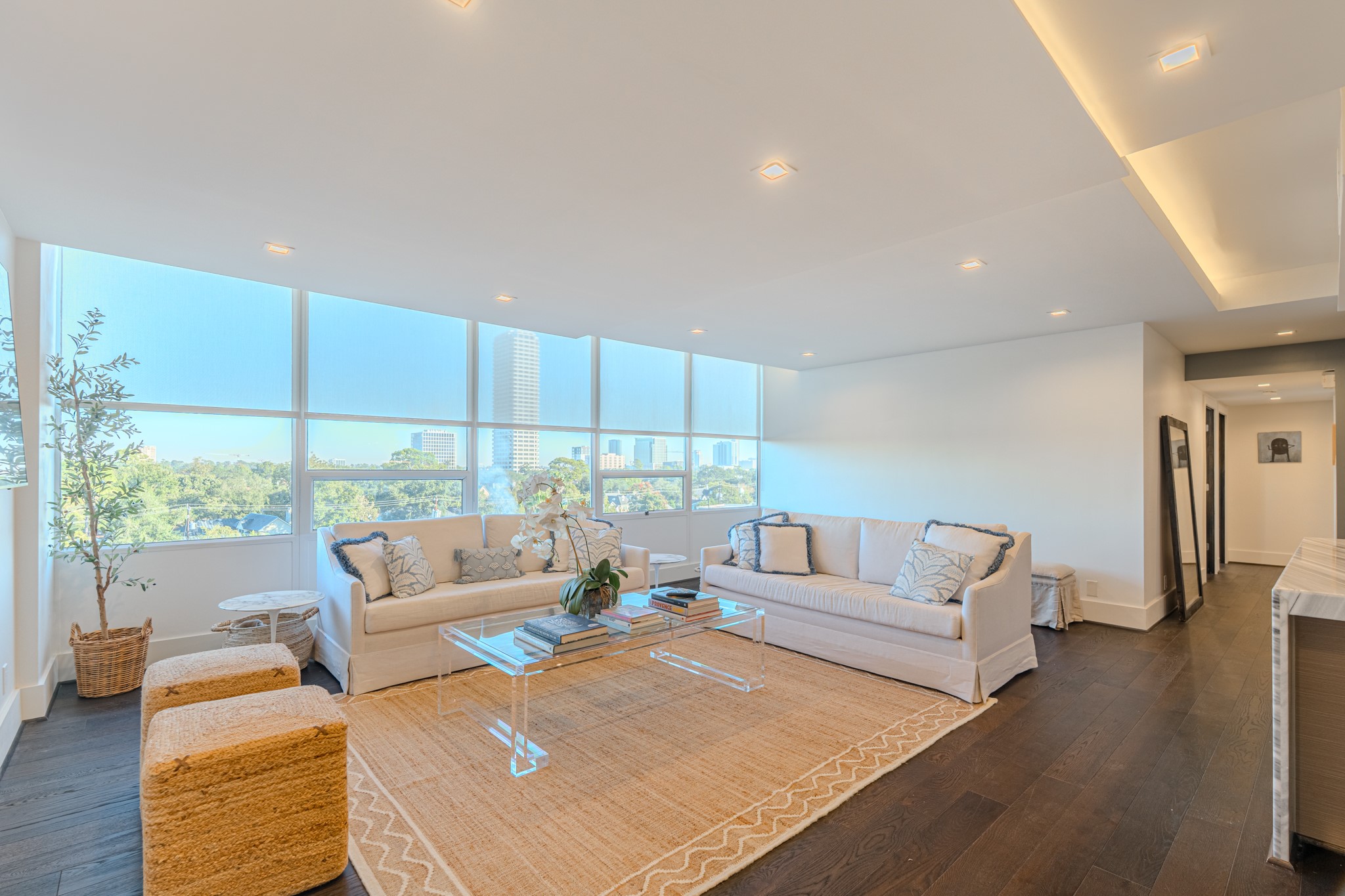 2701 Westheimer Road, Unit 6F Houston, TX 77098 - Photo 18 of 45 a living room with furniture and a large window