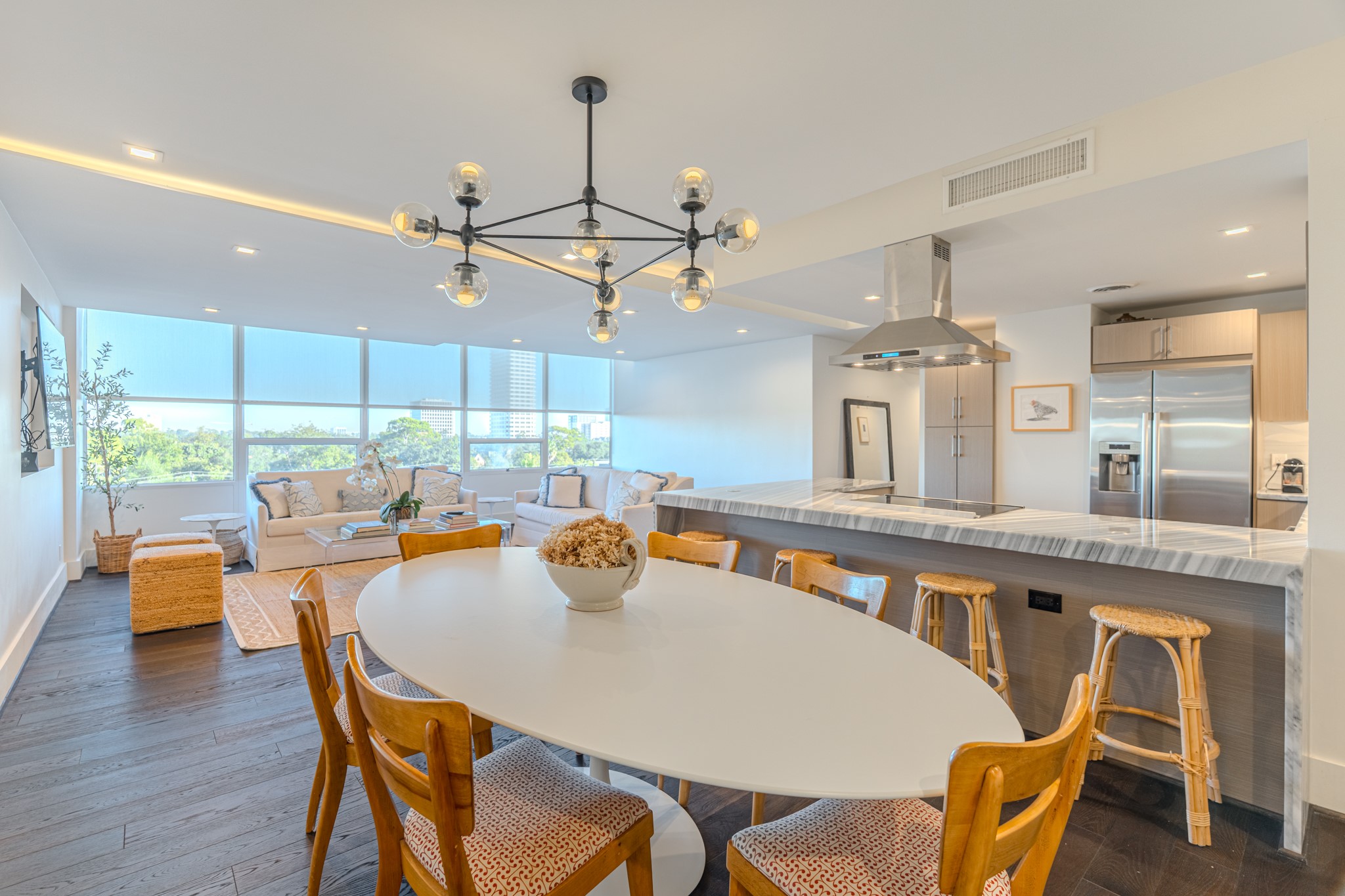 2701 Westheimer Road, Unit 6F Houston, TX 77098 - Photo 22 of 45 a dining table with chairs and window