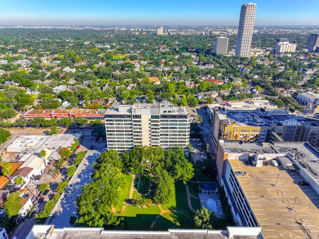 an aerial view of city and lake