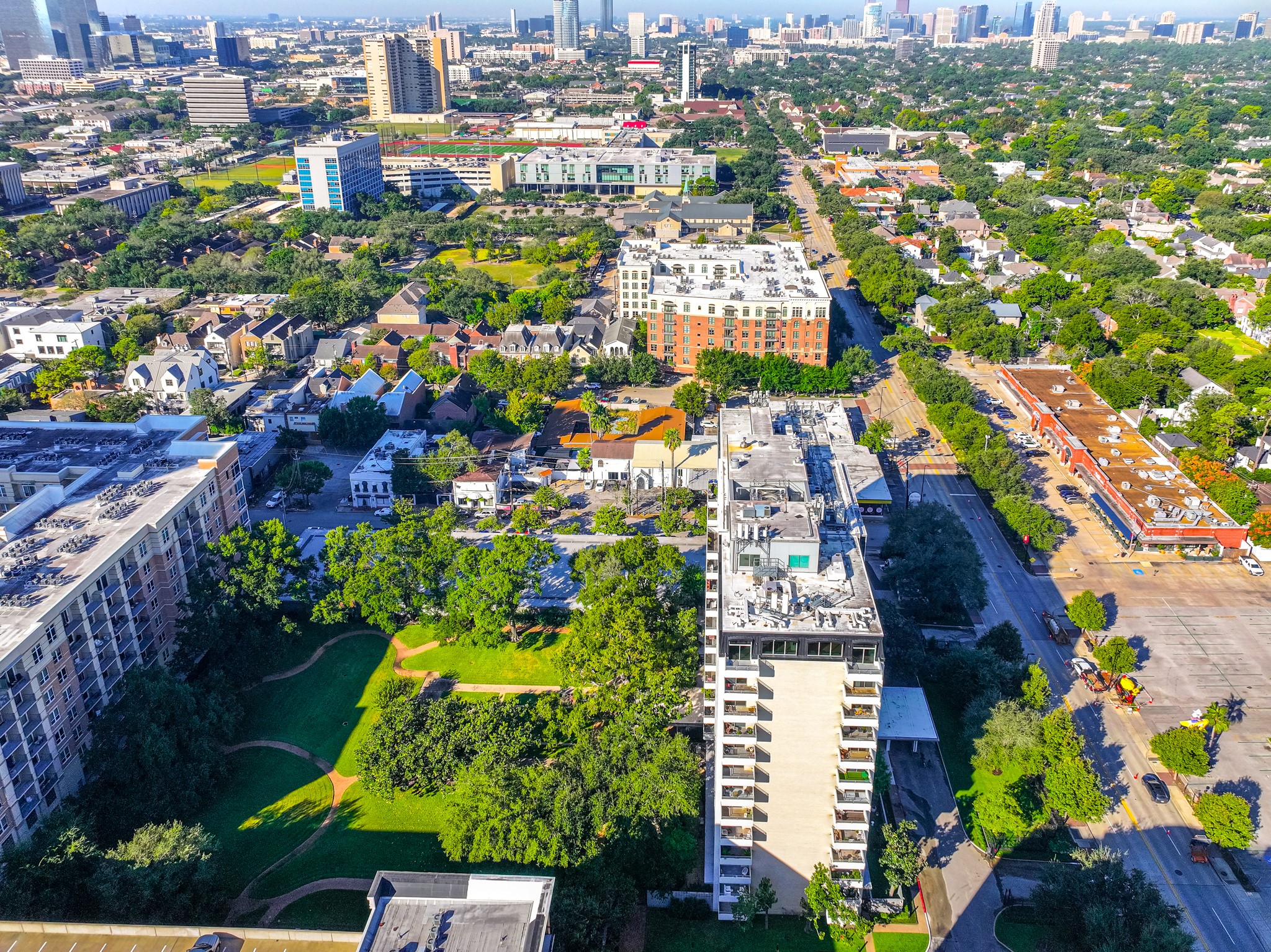 2701 Westheimer Road, Unit 6F Houston, TX 77098 - Photo 10 of 45 a view of a city and flowers