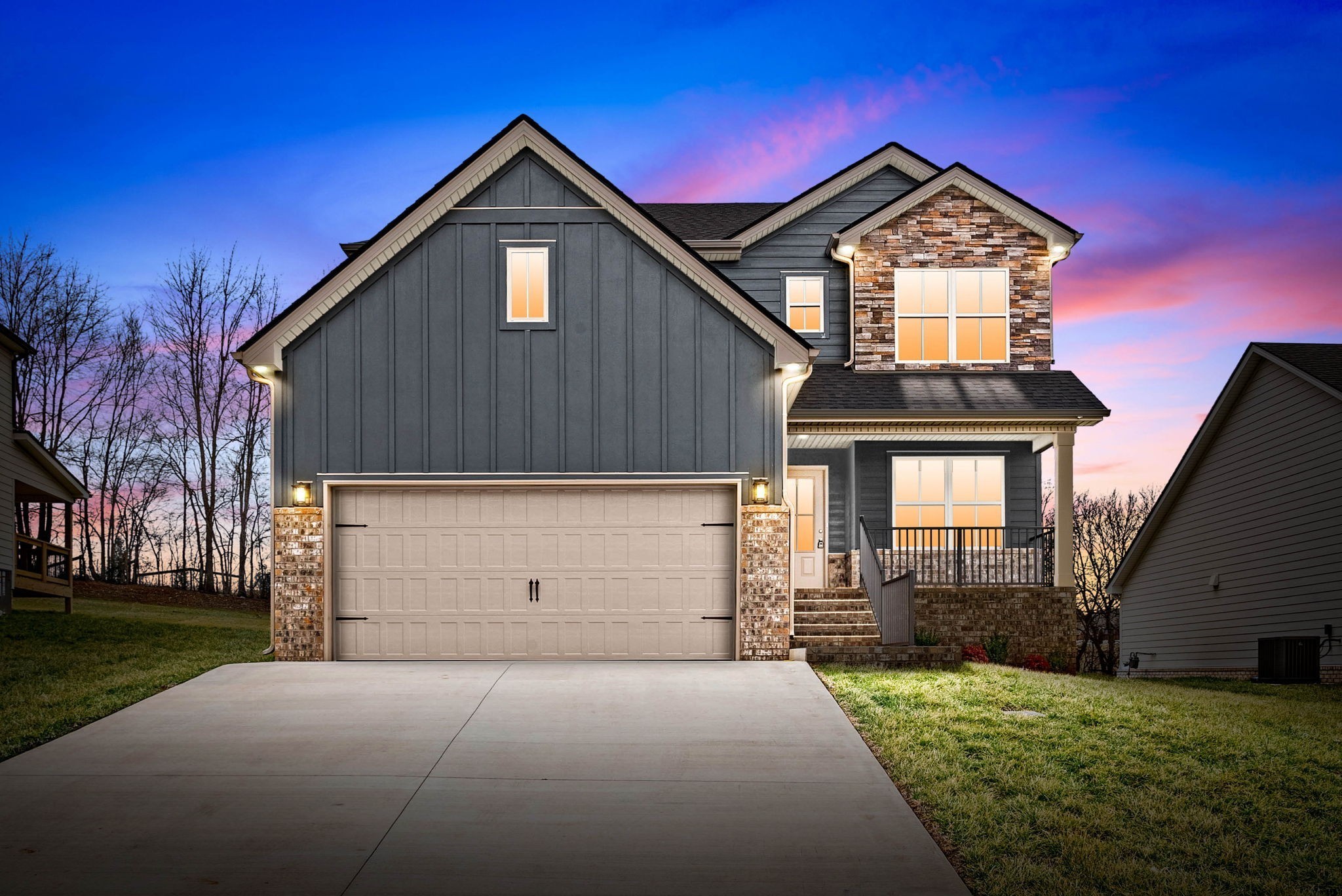 1592 Collins View Way Clarksville, TN 37043 - Photo 2 of 32 a front view of a house with a yard
