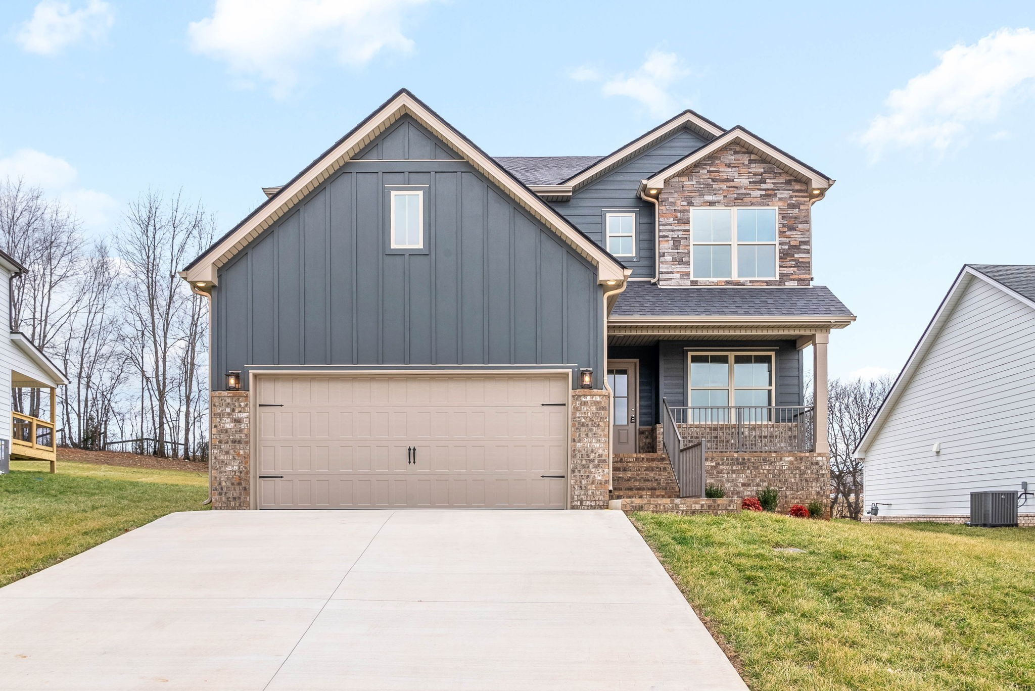 1592 Collins View Way Clarksville, TN 37043 - Photo 3 of 32 a front view of a house with a yard