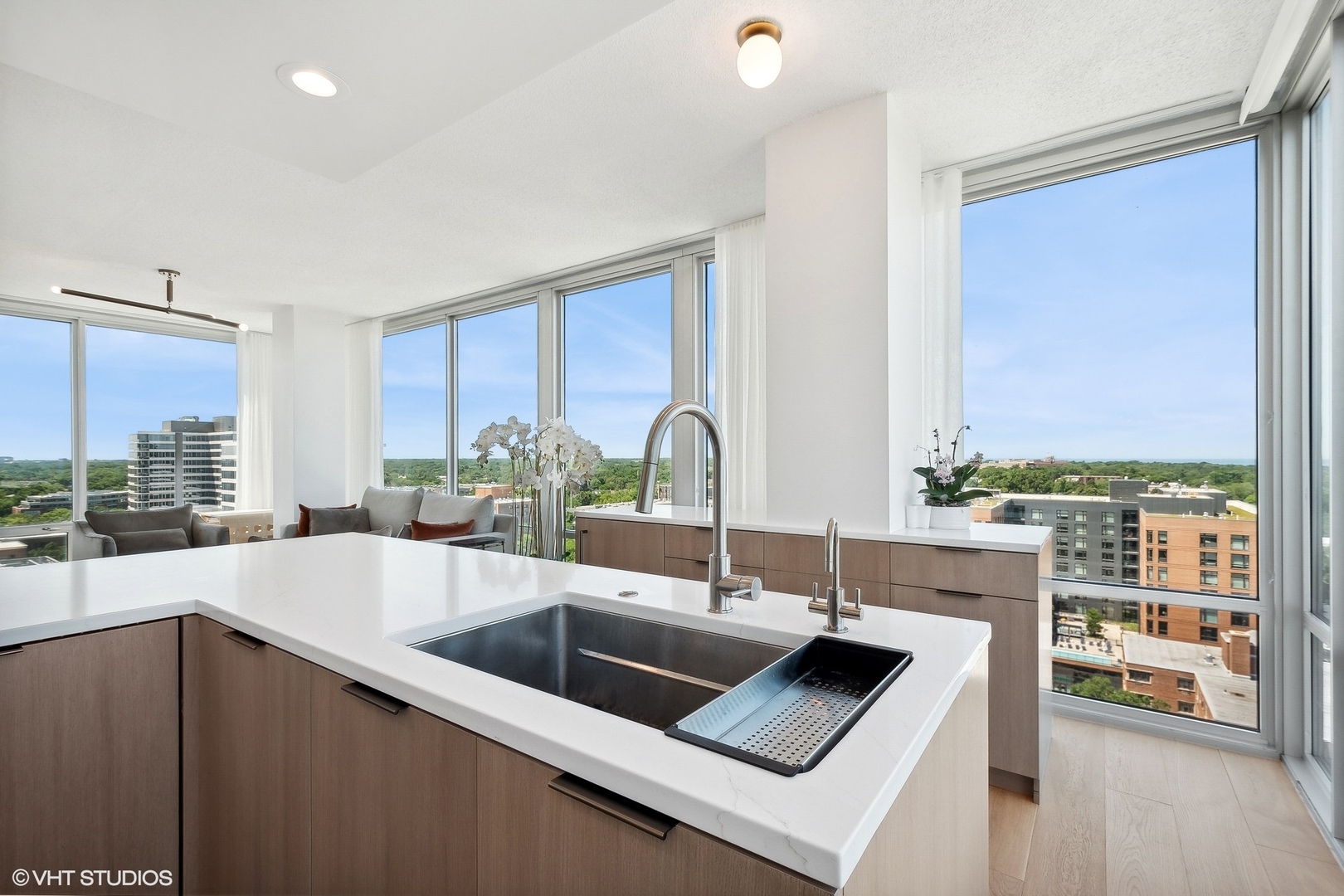 800 Elgin Road, Unit PH02 Evanston, IL 60201 - Photo 11 of 31 a kitchen with a sink and a large window