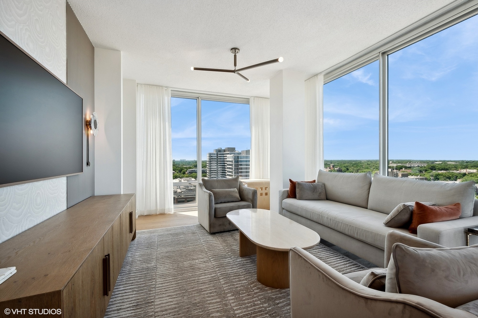 800 Elgin Road, Unit PH02 Evanston, IL 60201 - Photo 15 of 31 a living room with furniture and a large window