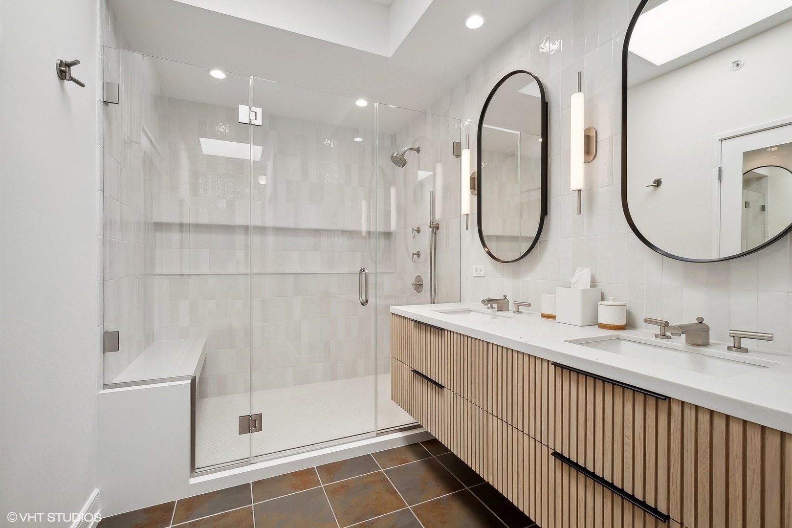 800 Elgin Road, Unit PH02 Evanston, IL 60201 - Photo 19 of 31 a bathroom with a double vanity sink mirror and shower