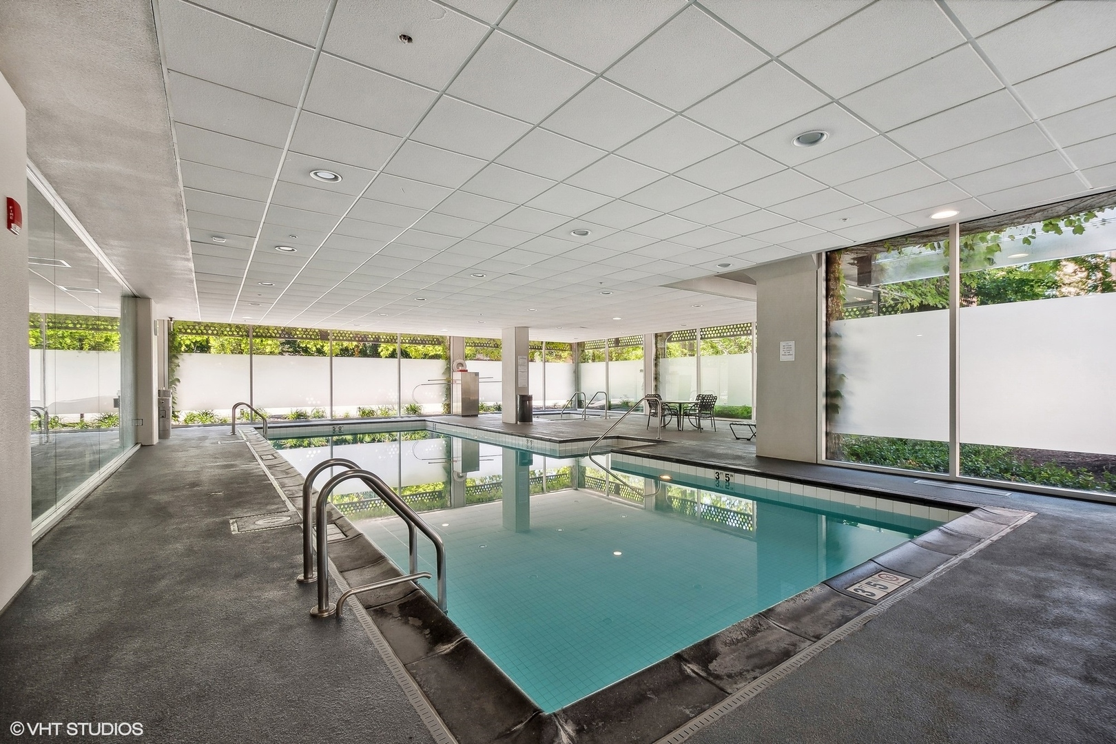 800 Elgin Road, Unit PH02 Evanston, IL 60201 - Photo 29 of 31 a view of a swimming pool and outdoor seating