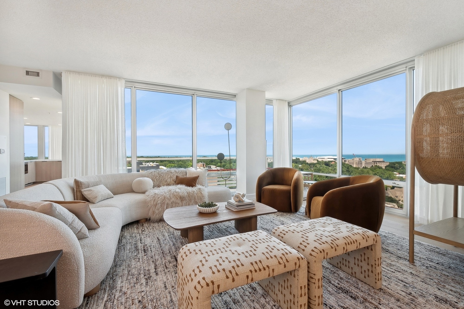 800 Elgin Road, Unit PH02 Evanston, IL 60201 - Photo 4 of 31 a living room with furniture and a large window