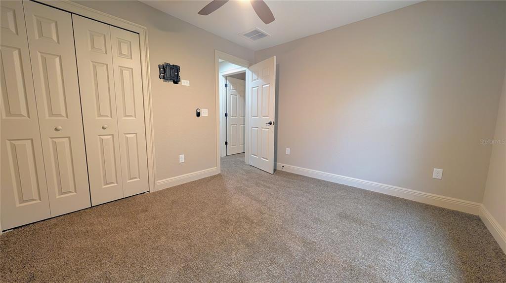 8802 Southwest 135th Place Ocala, FL 34473 - Photo 14 of 39 a view of an empty room and a window