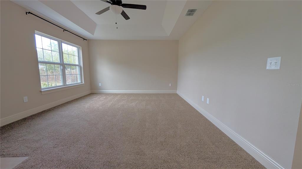 8802 Southwest 135th Place Ocala, FL 34473 - Photo 22 of 39 an empty room with a window