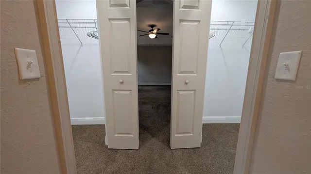 a small space with a white wall