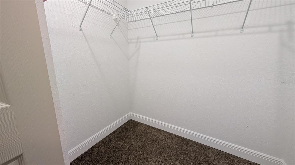 8802 Southwest 135th Place Ocala, FL 34473 - Photo 32 of 39 a small space with a white wall