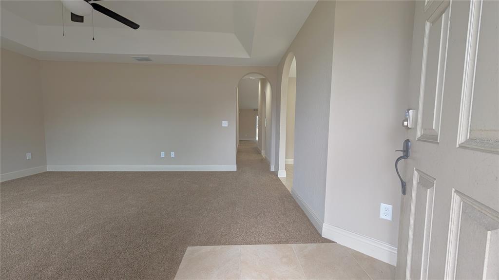 8802 Southwest 135th Place Ocala, FL 34473 - Photo 4 of 39 a view of a room that has a window