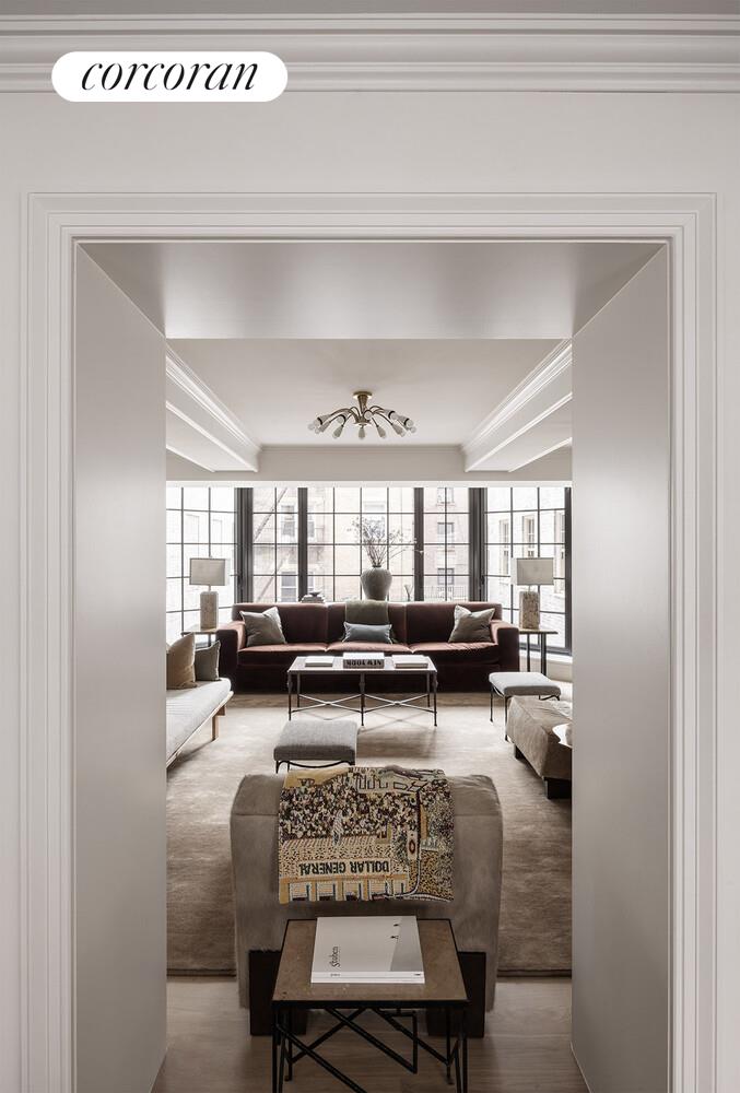 118 West 13th Street, Unit 3 Manhattan, NY 10011 - Photo 10 of 31 a living room with furniture and a large window