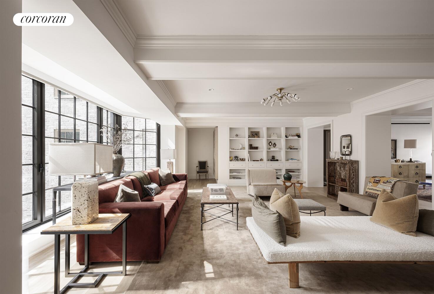 118 West 13th Street, Unit 3 Manhattan, NY 10011 - Photo 3 of 31 a living room with furniture and a large window