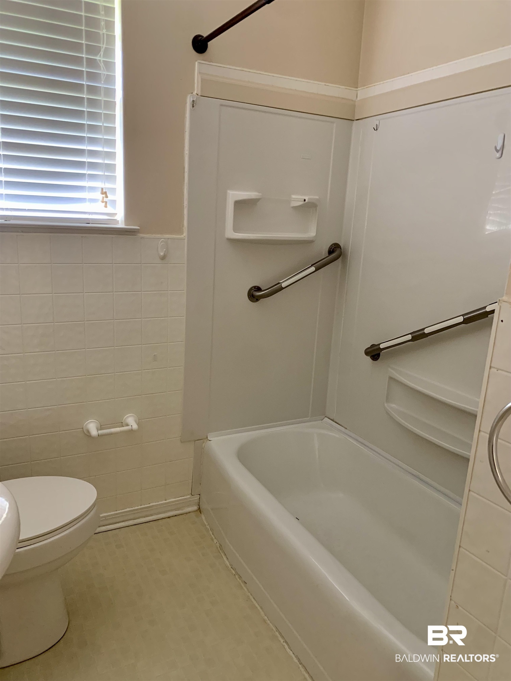 2710 West Road Mobile, AL 36693 - Photo 7 of 10 Bathroom with toilet, shower / tub combination, and tile patterned flooring