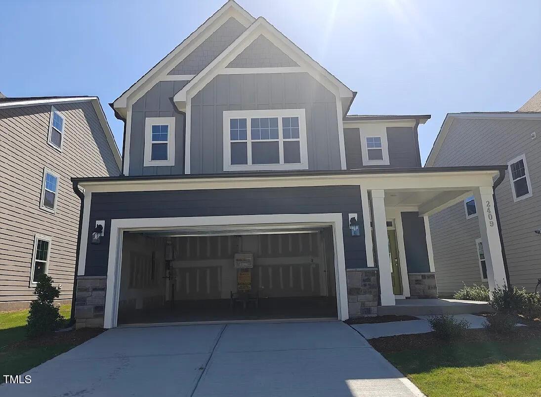 a front view of a house with yard